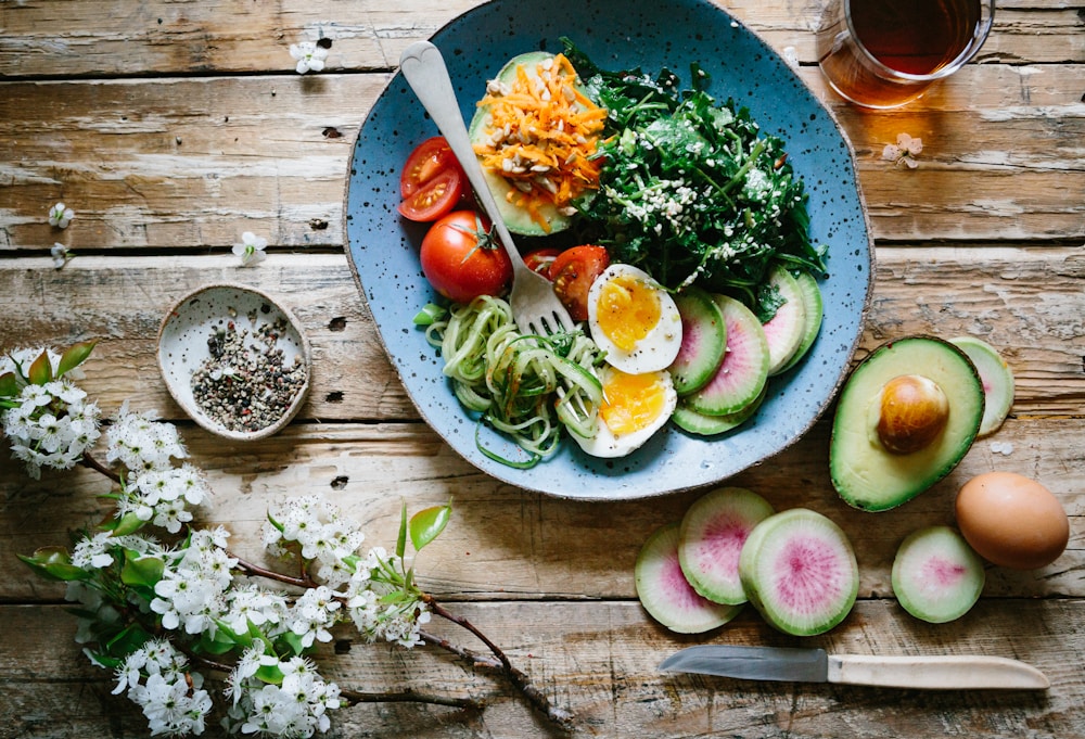 Wholesome sports nutrition meal with tomatoes and avocado